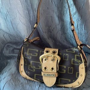 Brown and tan guess mini hand bag .